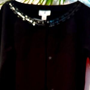 Talbots size medium with sparkle stone neckline . Very pretty layering sweater